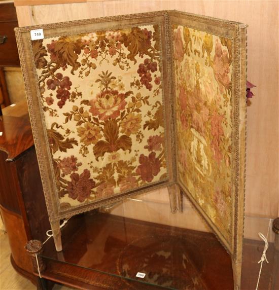 A Victorian two fold screen H.3ft W. 2ft 11in. per panel